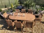 Teak Extending Table With 8 Stacking Chairs
