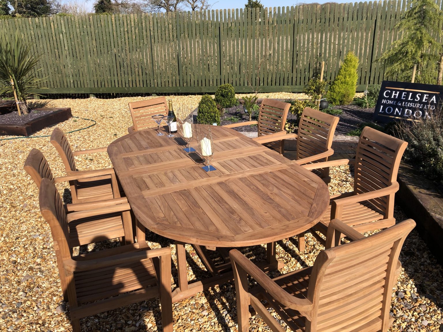 teak extending table with 8 stacking chairs Teak Garden Furniture Outlet