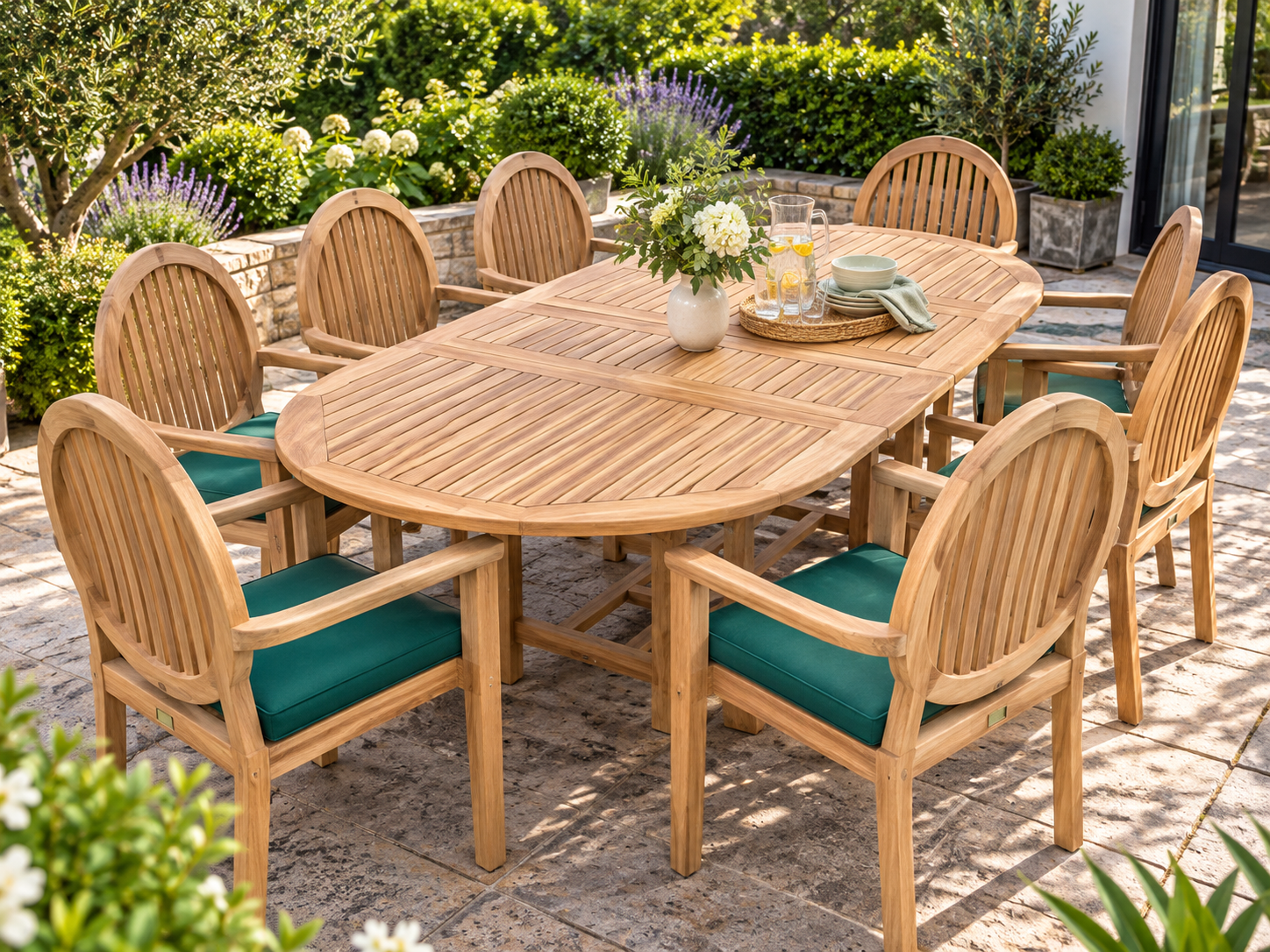 8 Seater Teak Oval Extending Garden Dining Set 8 seater teak oval extending garden dining table with eight high-back armchairs and green cushions